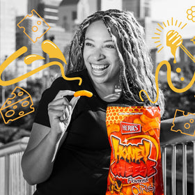 Herr's Honey Cheese Flavored Curls crunch image emphasizes a light gluten-free bite.