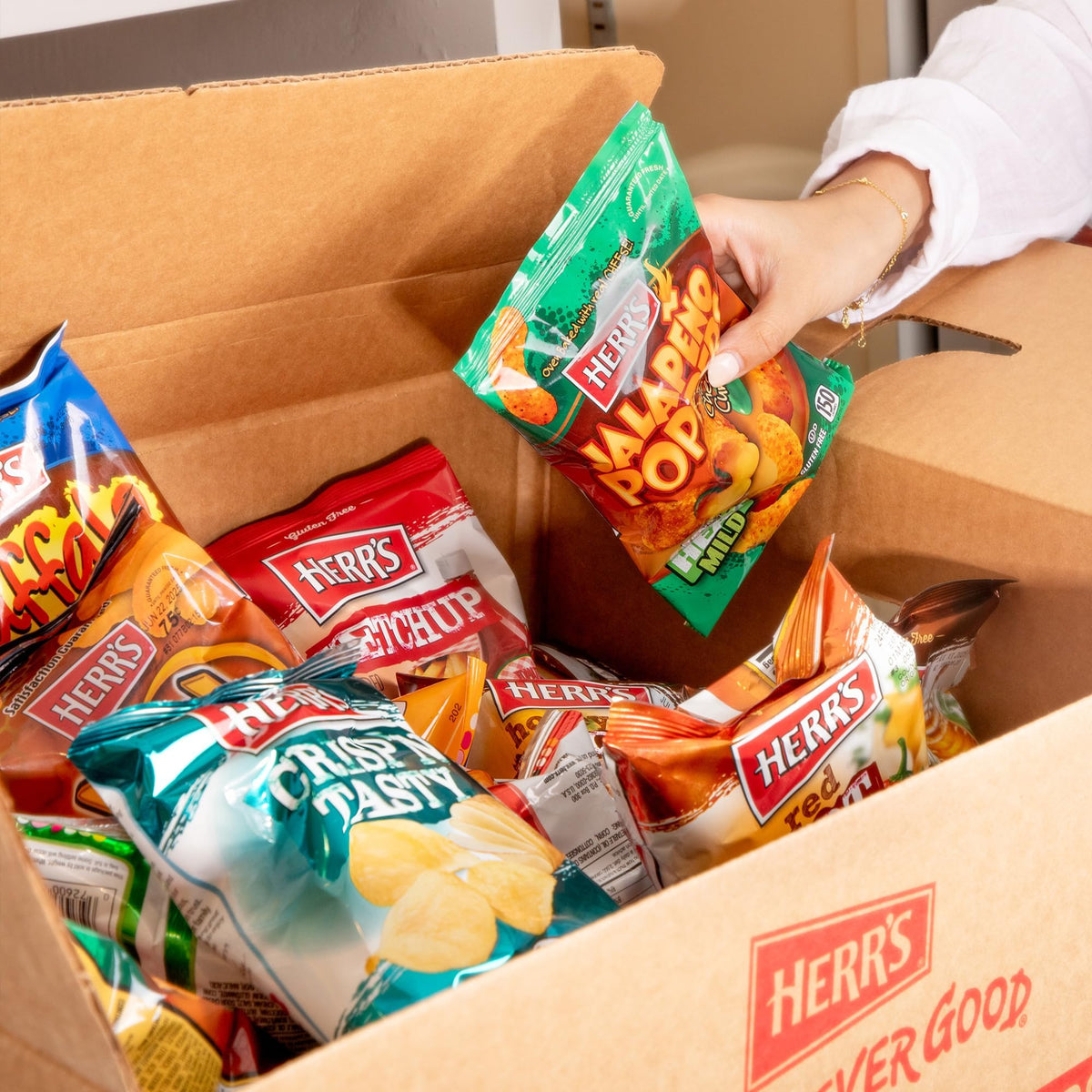 Herr's lunch-gaming-snack-cheese-curls ideal for quick flavor on the go.