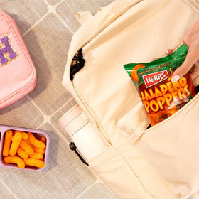 Herr's movie-time-cheddar-poppers elevate breaks with bold cheddar notes.