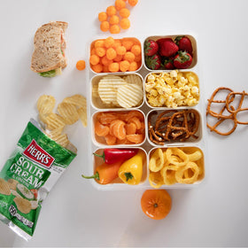 Herr's Sour Cream and Onion chips with-dip show the perfect pairing for party platters