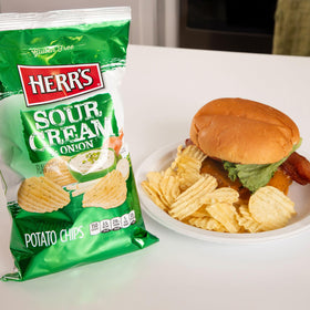 Herr's Sour Cream and Onion chips crisp-closeup highlights the satisfying crunch for dipping