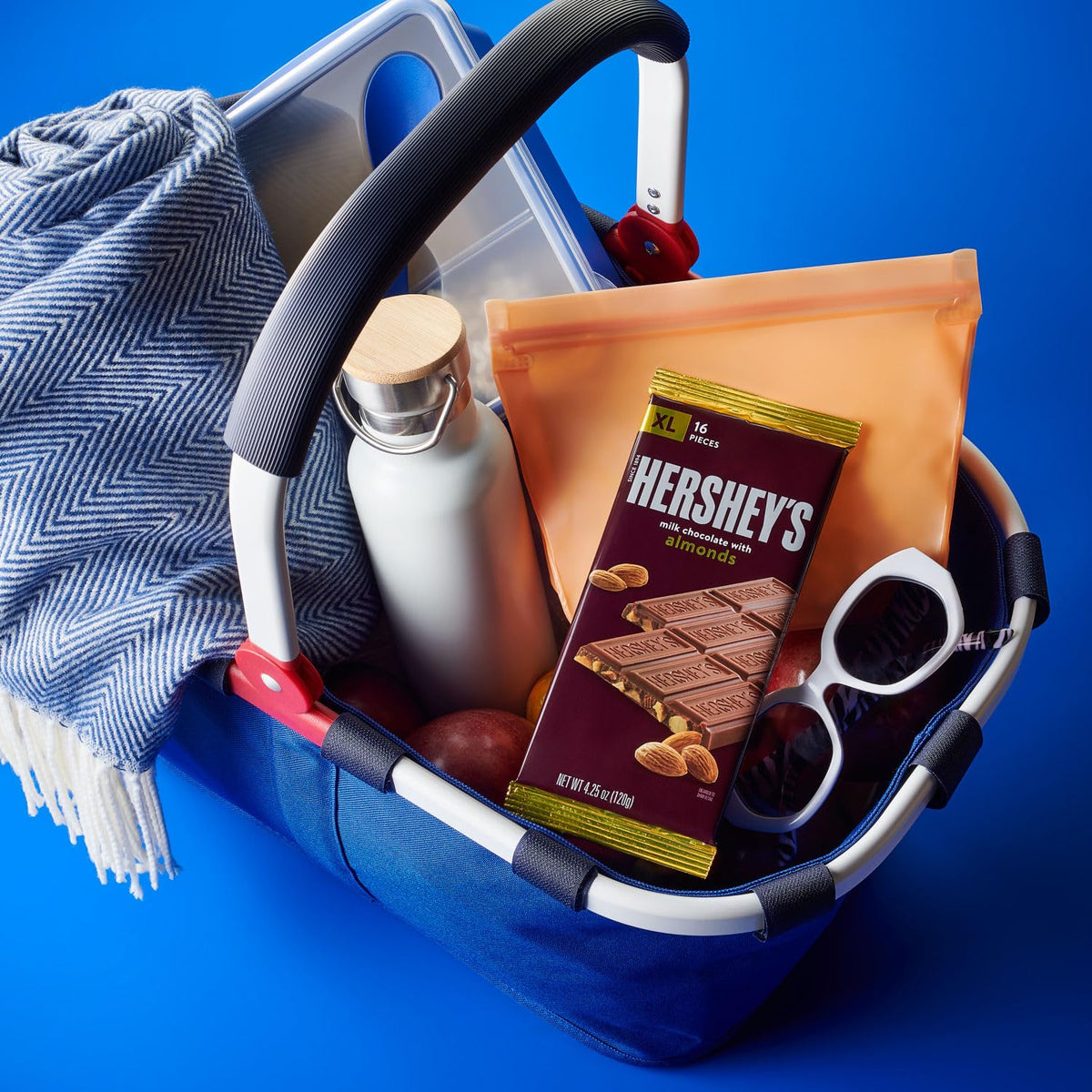 Gift-ready HERSHEY'S almond bars montage; celebrations-friendly packaging.