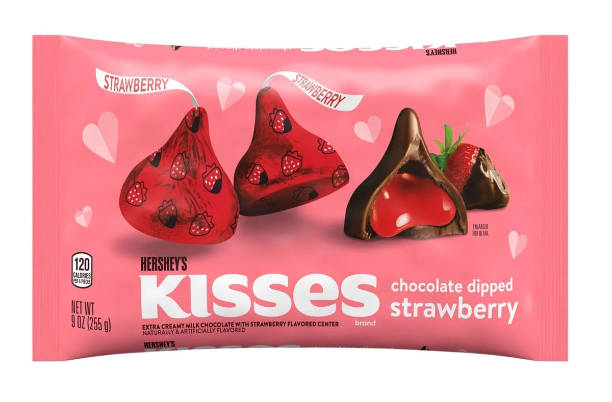 Hershey's Kisses close-up of strawberry filling and creamy center, delicious treat.