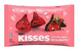 Hershey's Kisses close-up of strawberry filling and creamy center, delicious treat.