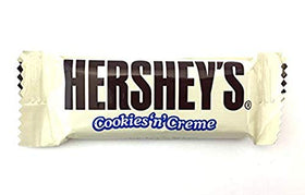 Cross-section of Hershey's Cookies 'n' Creme showing cream and cookie bits.