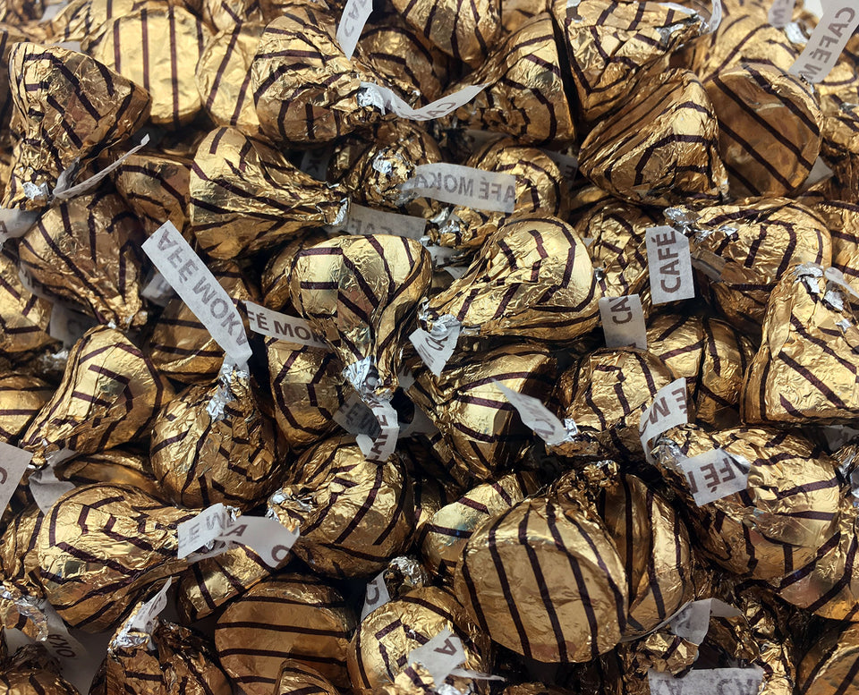 Hershey's Kisses Espresso in gold-foil pack, ideal for sharing at gatherings
