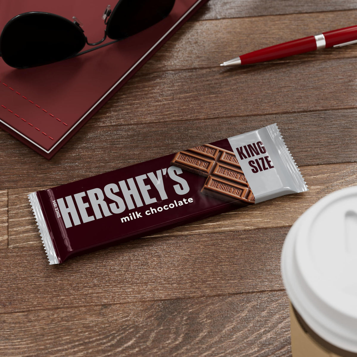S'mores night ready with Hershey's milk chocolate bars over a campfire