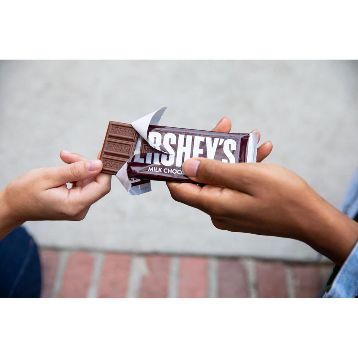 Holiday stockings and gift baskets featuring Hershey's bars.