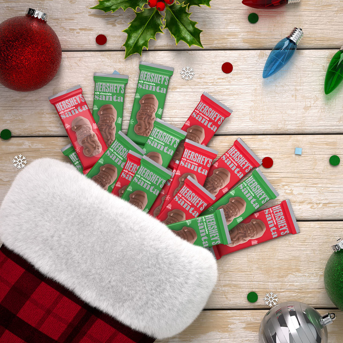 HERSHEY'S Milk Chocolate Santas on a holiday dish for sharing