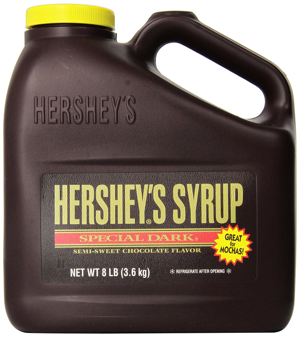 Hershey's Special Dark Syrup poured over dessert for a rich chocolate drizzle.