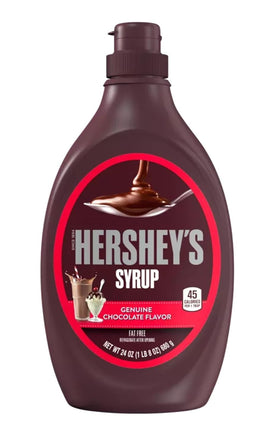 Hershey's Strawberry Syrup bottle drizzled over desserts for real fruit taste