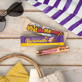 Whatchamacallit bars close-up, crispy bits with chocolate and caramel.