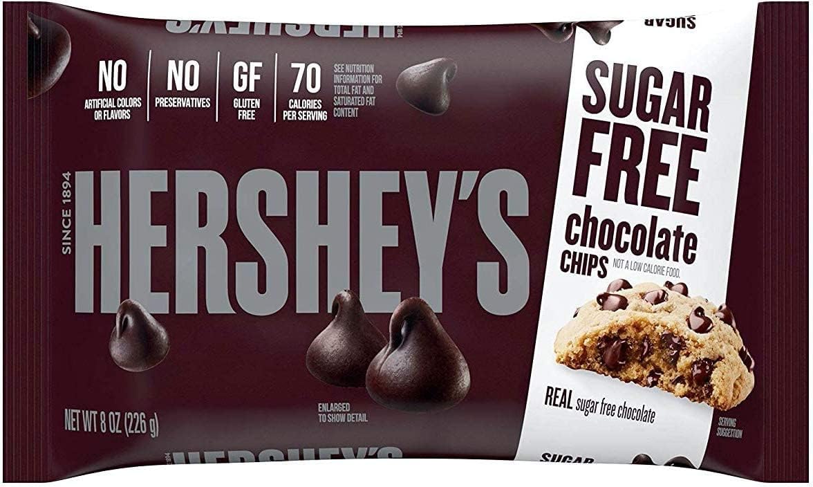 Hersheys Zero Sugar chips on cookie dough for rich, sugar-free cookies.
