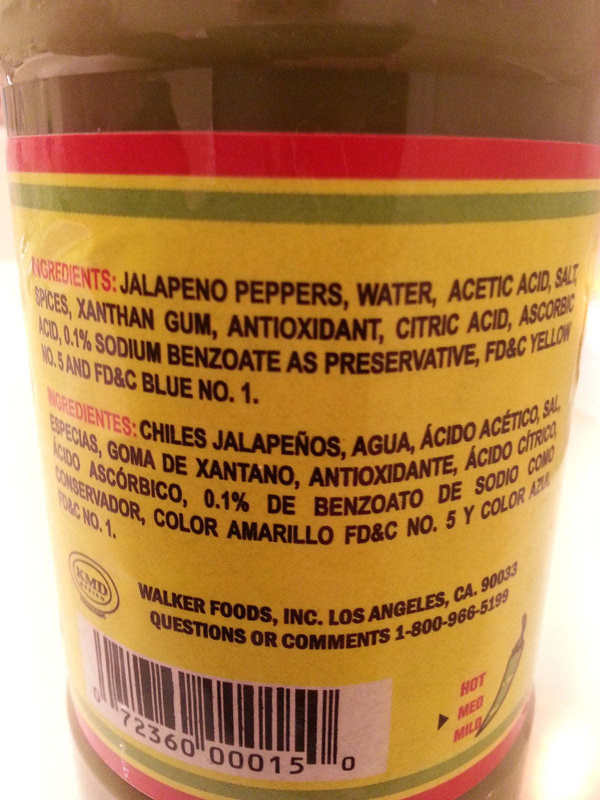 Heywood El Pato Green Jalapeno Hot Sauce pour shot for easy topping
