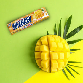 Close view shows HI-CHEW Mango Sticks in hand for on-the-go snacking