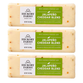 Hickory Farms jalapeño cheddar cheese blend 3-pack on a board for bold snacking.