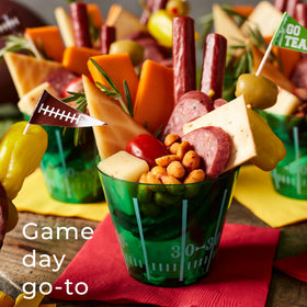 Hickory Farms Signature Beef Summer Sausage on a charcuterie board ready for guests