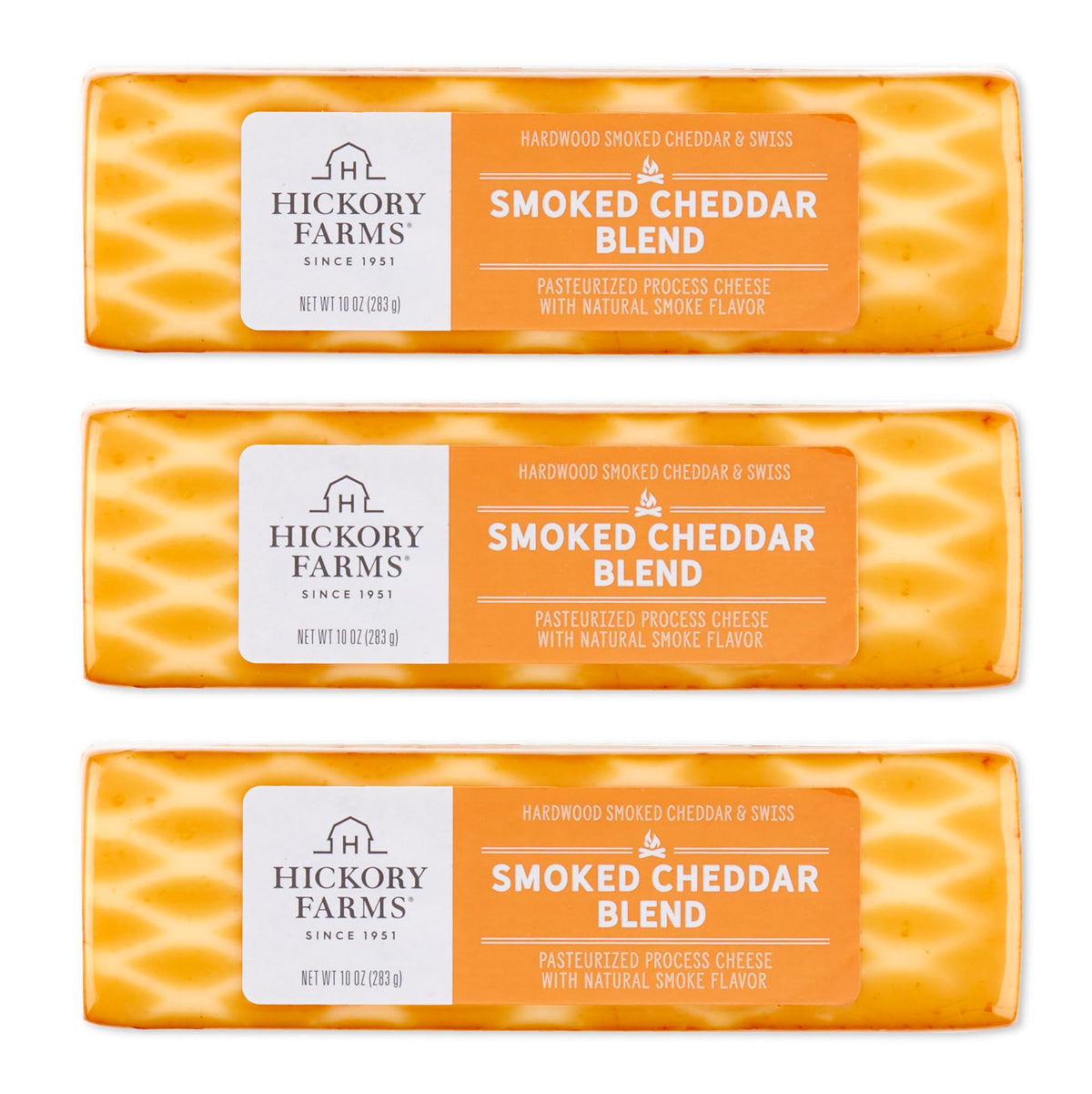 Hickory Farms smoked cheddar blend blocks on a cutting board, ideal for snacking.