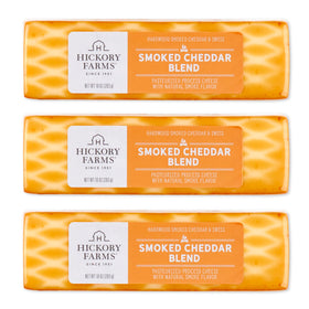 Hickory Farms smoked cheddar blend blocks on a cutting board, ideal for snacking.