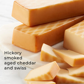 Hickory Farms smoked cheddar blend on a charcuterie board with sausage for entertaining.