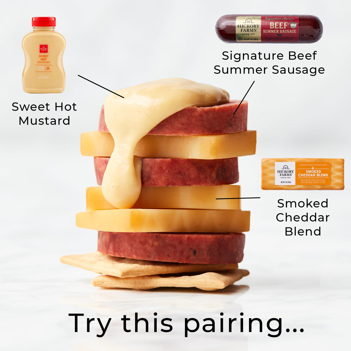 Hickory Farms smoked cheddar blend packaging in a 3-pack display.