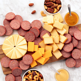 Hickory Farms Smoked Cheddar Blend slices for a rich cheese board.