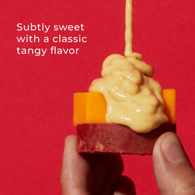 Sweet Hot Mustard on a charcuterie board with meats and cheeses
