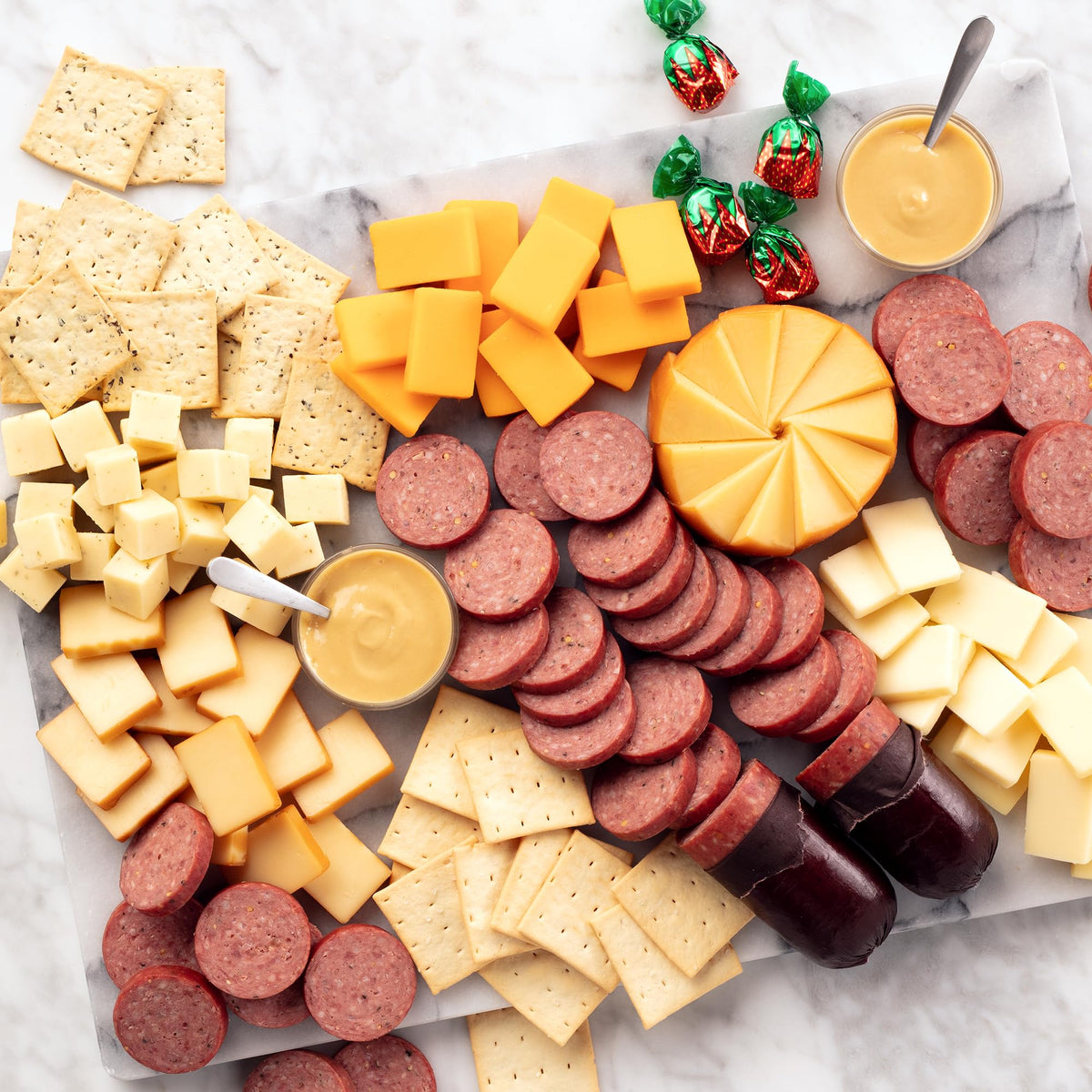 Hickory Farms three cheese & onion blend 7oz on a board