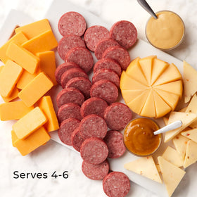 Hickory Farms Sharp Cheddar Blend 7oz delivers rich, tangy flavor.