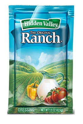 Hidden Valley Ranch dressing dipping vegetables for quick snacking.