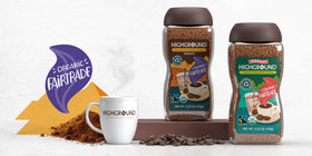 Highground decaf instant coffee granules dissolving in water for fast brew.