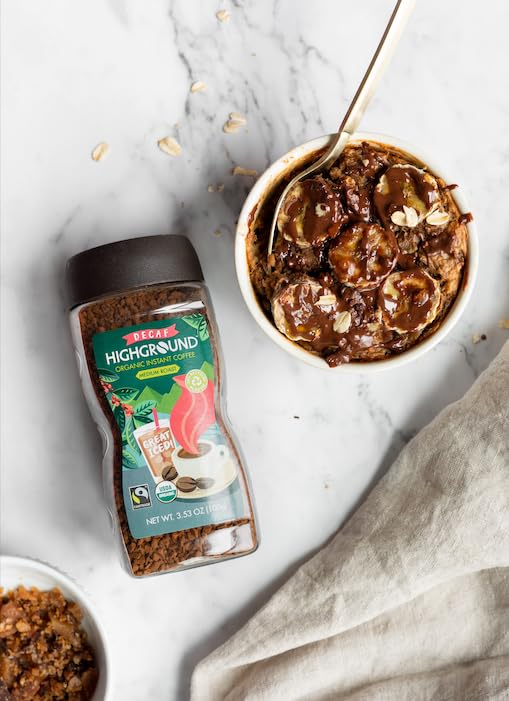 Pack of six Highground Organic Decaf Instant Coffee on a store shelf for value.
