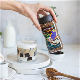 Highground Organic Regular Instant Coffee steaming over a cup, inviting aroma