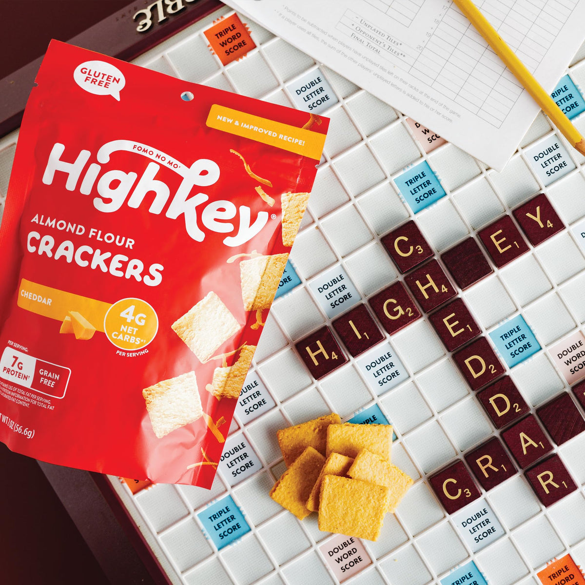 HighKey cheddar crackers closeup reveals cheddar and almond texture for a low-carb bite.
