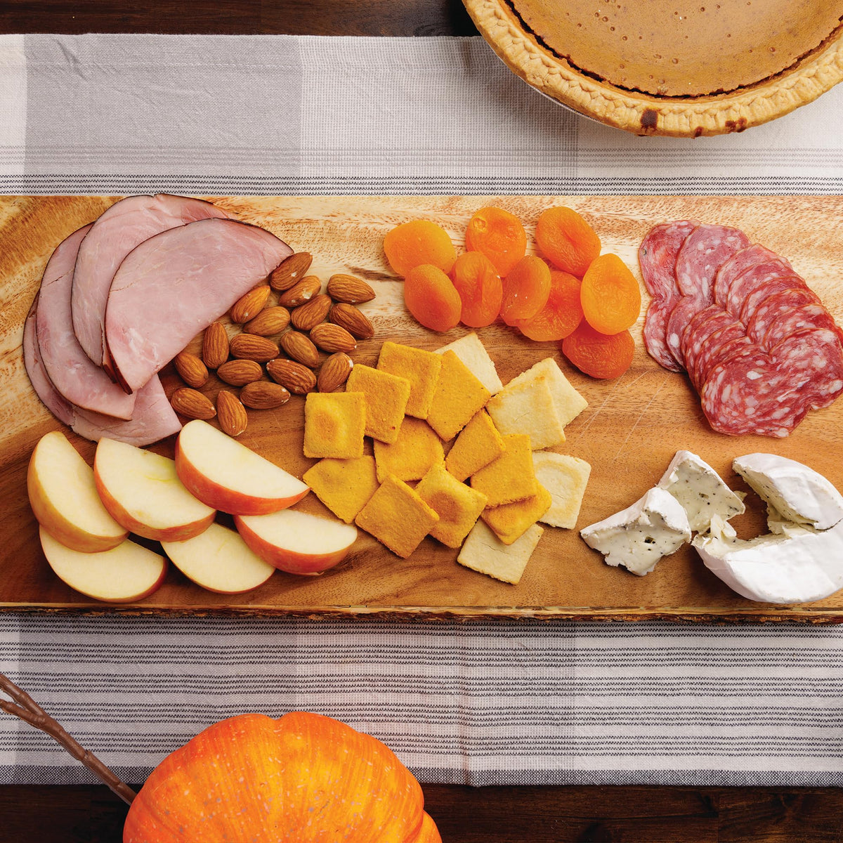 HighKey cheddar crackers serving with dip, ideal for cheese boards.