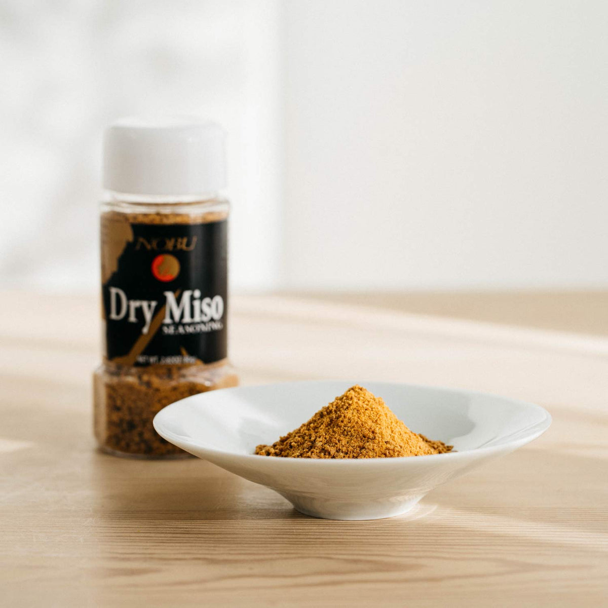 Hikari Miso Nobu Dry Miso Seasoning on salad provides quick, savory accent