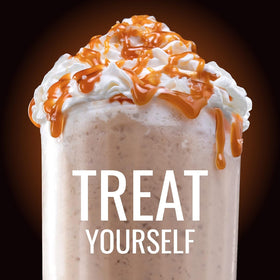 Hills Bros Frappés Chocolate Espresso cup with whipped cream topping for a premium at-home pick-me-up