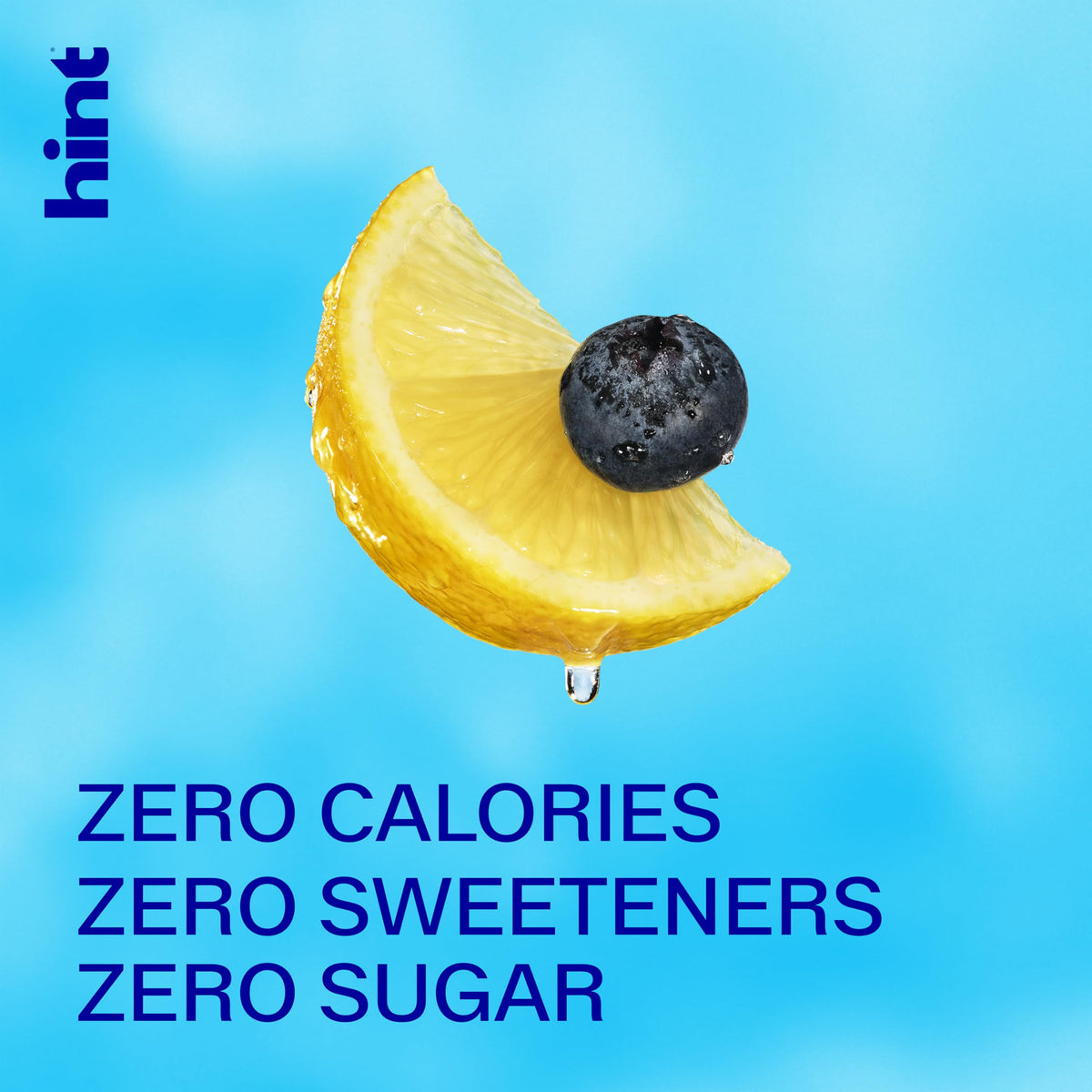 Hint Blueberry Lemon water glass pour showing vibrant flavor without sugar.
