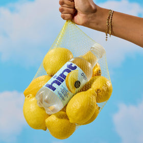 Hint label closeup highlights natural fruit essences.