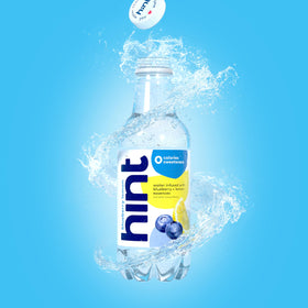 Close-up of Hint bottle with purified water and natural fruit essences.