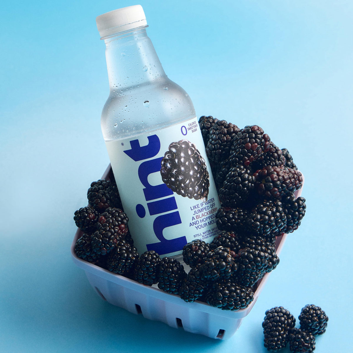 Hint water bottle with fruit essence droplets