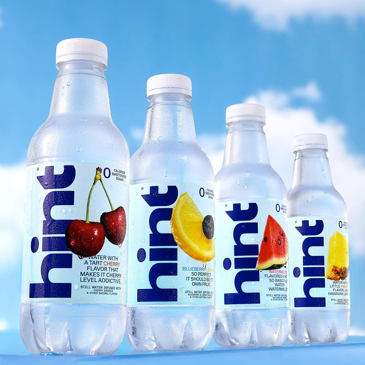 Illustration of Hint Pineapple Water splash suggesting fruity aroma.