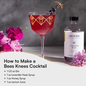 HipStirs Lavender Haze Syrup in a tall glass adds floral notes to tea.