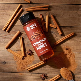 HIVE Food Co. infused honey cinnamon bottle pour demonstrates easy drizzle control.