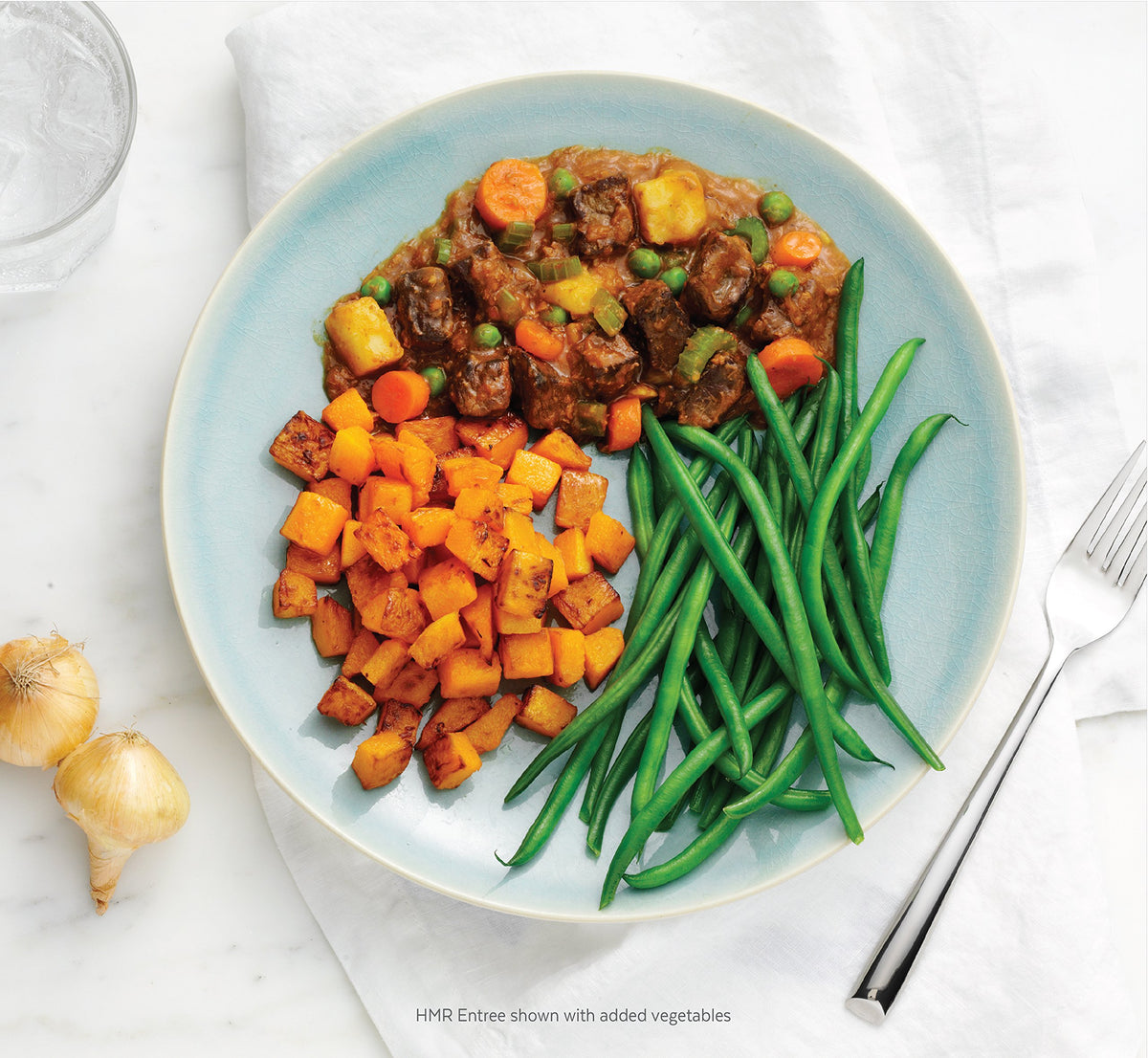 HMR Beef Stew microwave-ready plate demonstrating quick 1-minute heating for busy evenings.