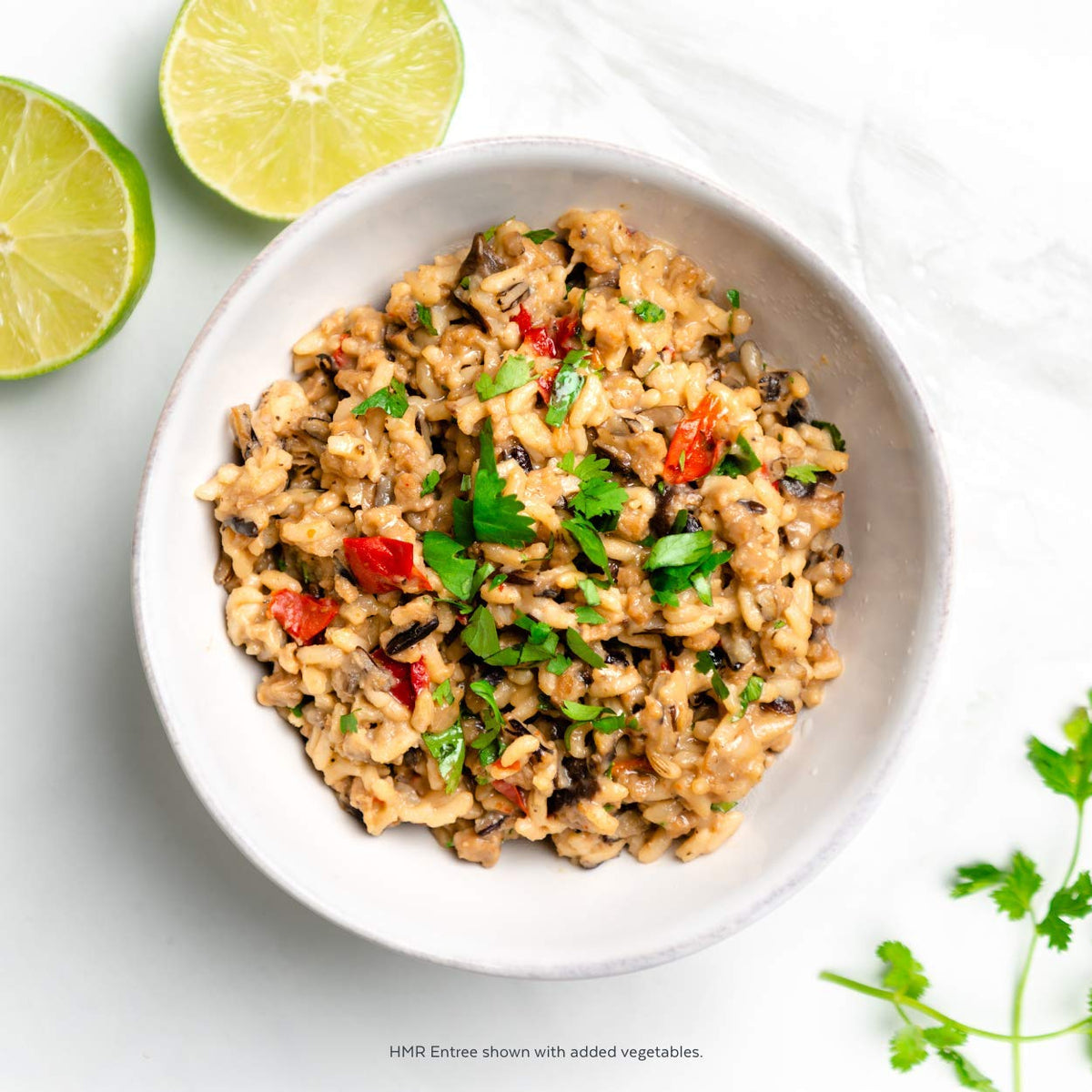 Close-up of mushrooms and rice highlights savory ingredients in HMR Entree