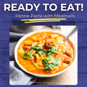 HMR Penne Pasta with Meatballs entree tomato sauce and meatballs close-up.