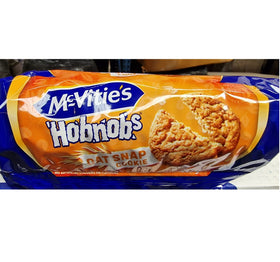 Hobnobs Original on a tea tray with cup, ideal for dunking.