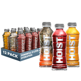 HOIST Premium Hydration bottle being poured for rapid electrolyte refreshment.