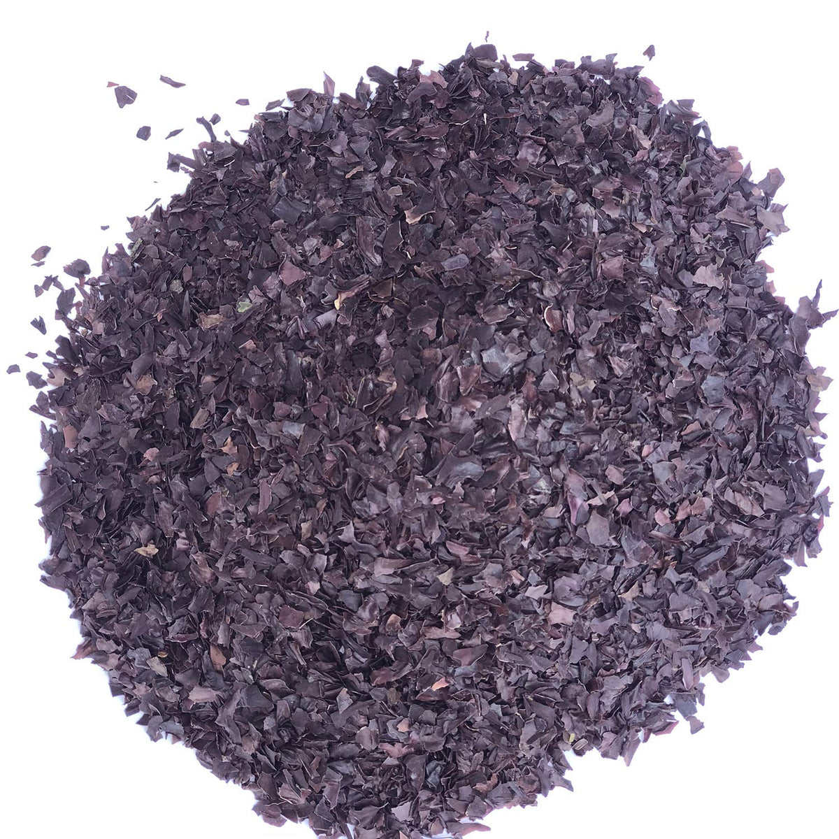 Holfcitylf dulse flakes raw texture close-up, sun-dried seaweed